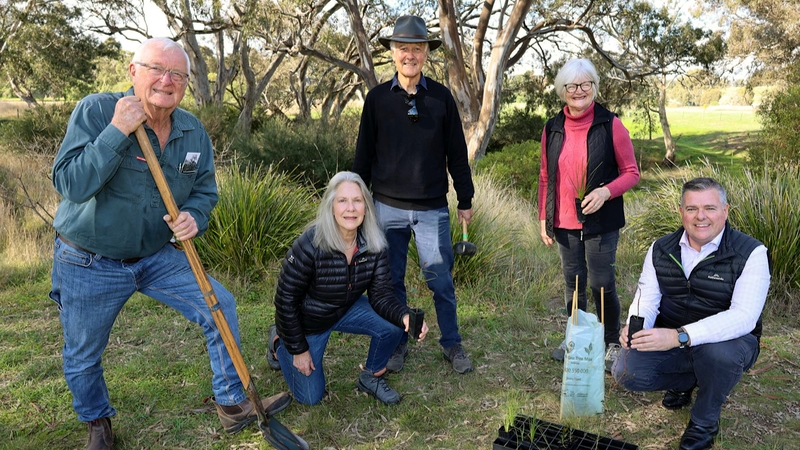 Geelong councillors Jim Mason (left) and Anthony Aiken (right) work with Batesford, Stonehaven, Fyansford Landcare Group members Felicity and Peter Spear and Helen Percy.